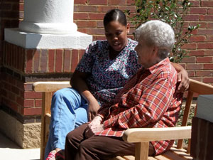 nurse and patient smiling